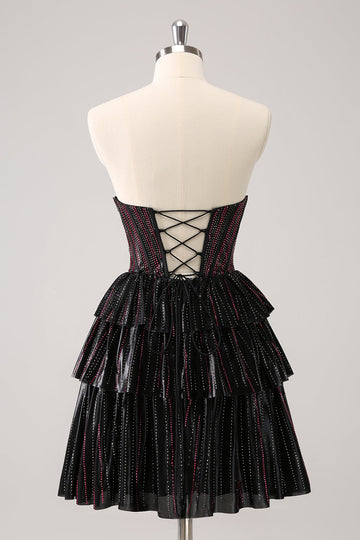 Vestido de cóctel escalonado negro rosa brillante con pedrería